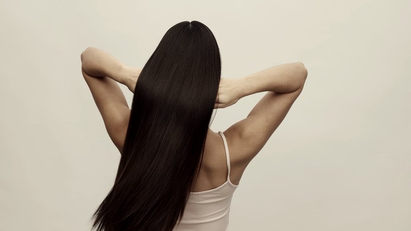 Cabelo liso e brilhante finalizado no salão